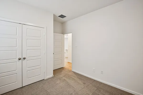 an empty room with closet