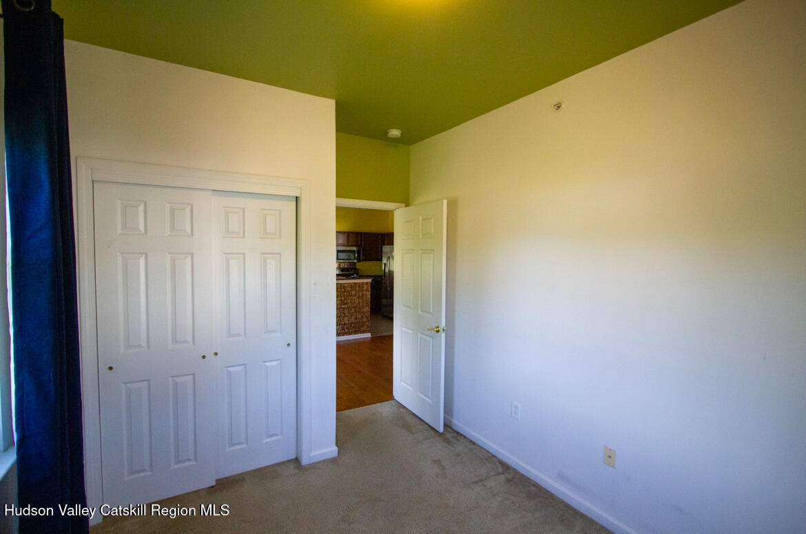 402 Commons Lane Saugerties, NY 12477 - Photo 11 of 29 a view of hallway with wooden floor