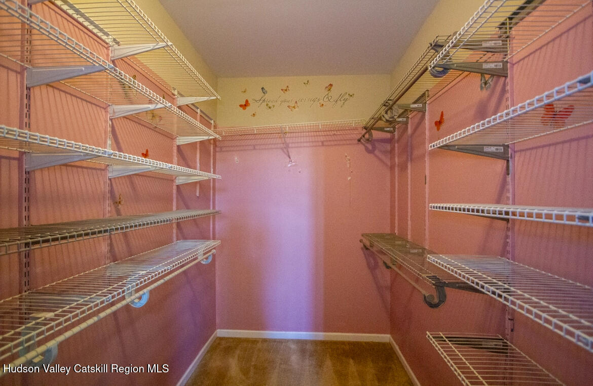 402 Commons Lane Saugerties, NY 12477 - Photo 15 of 29 a view of a room with racks on the wall