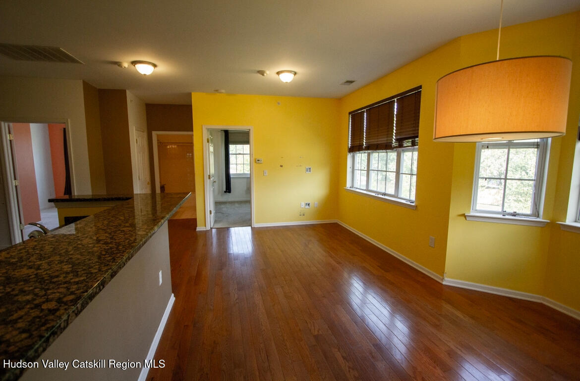 402 Commons Lane Saugerties, NY 12477 - Photo 17 of 29 a view of hallway with wooden floor