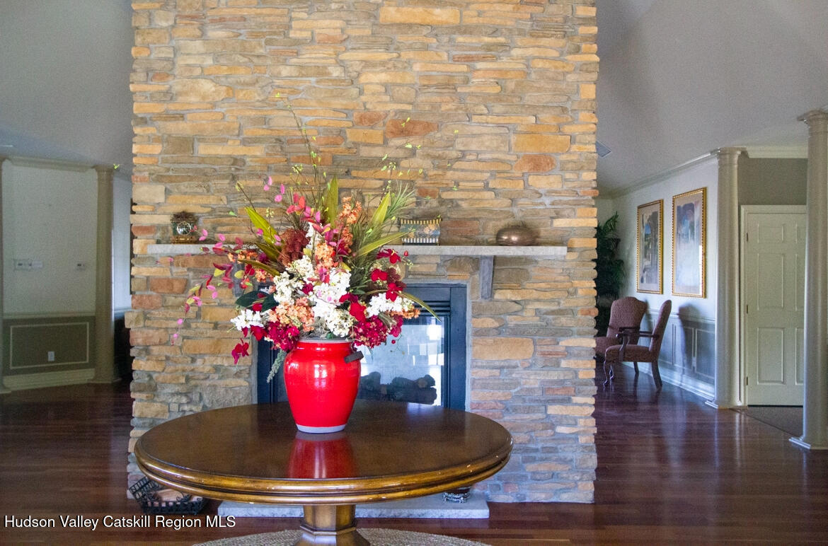 402 Commons Lane Saugerties, NY 12477 - Photo 26 of 29 a vase of flowers sitting on a table