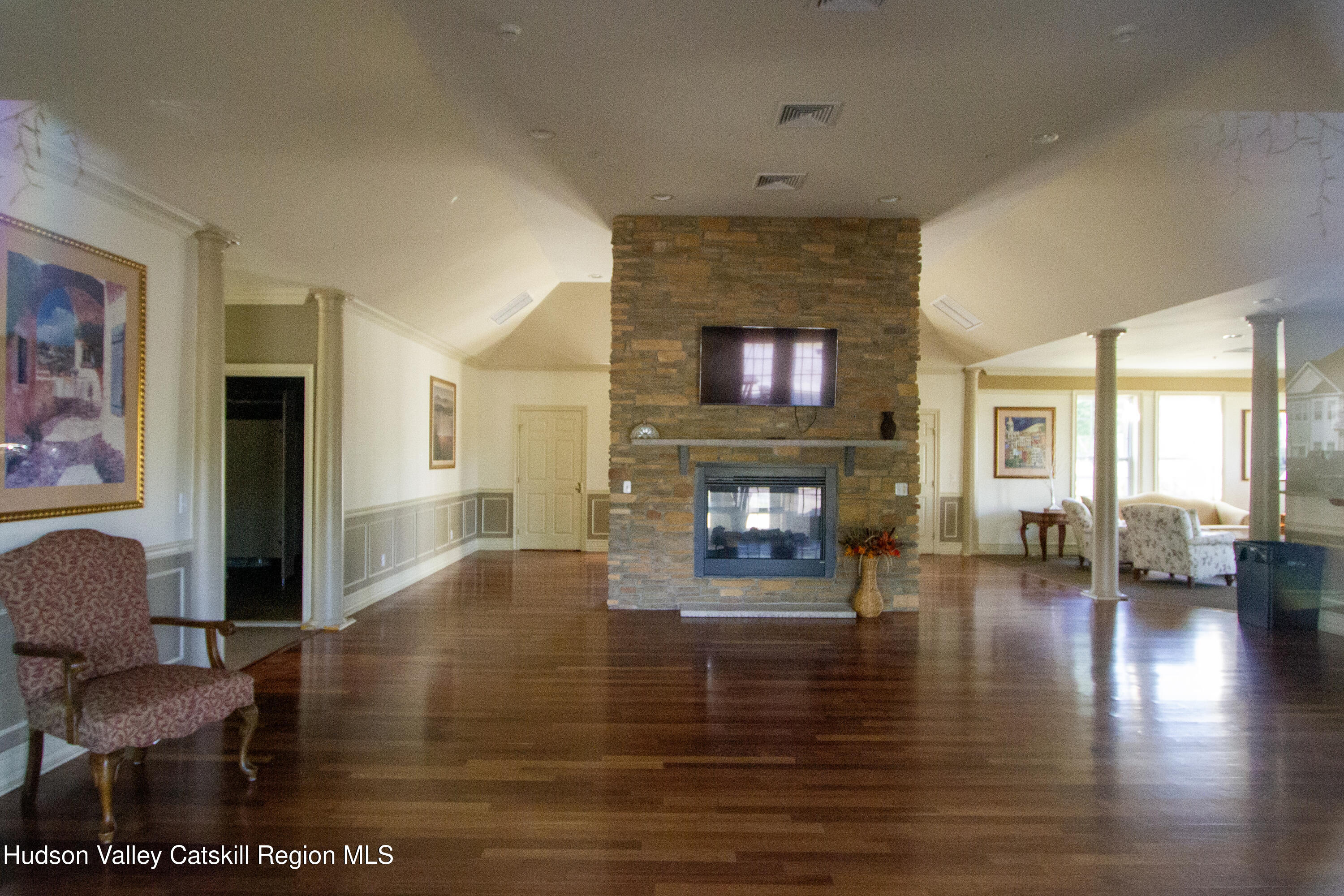 402 Commons Lane Saugerties, NY 12477 - Photo 27 of 29 a living room with furniture and a fireplace