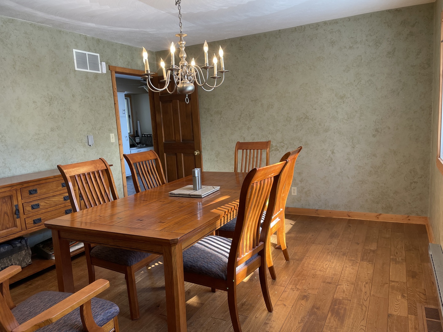 5650 West Bluff Road Morris, IL 60450 - Photo 12 of 53 a view of a dining room with furniture and chandelier