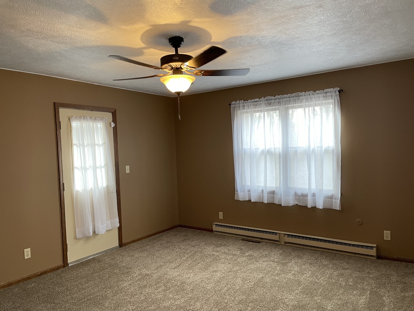 5650 West Bluff Road Morris, IL 60450 - Photo 21 of 53 a view of an empty room with a window