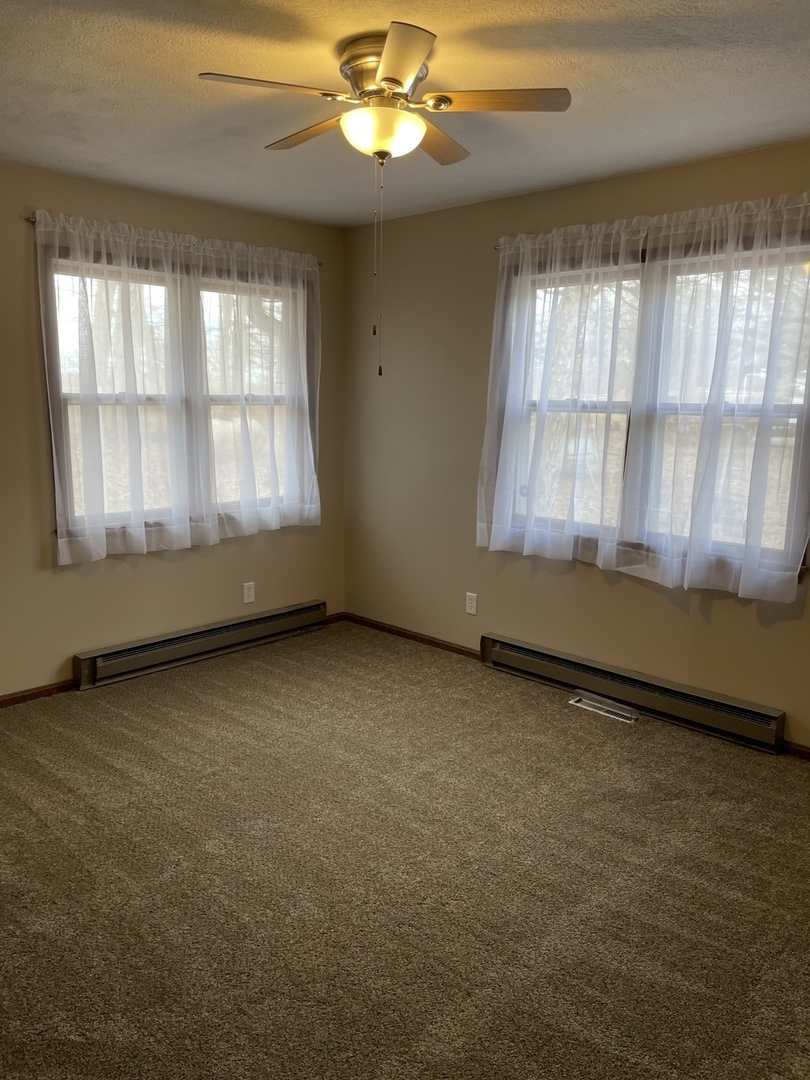 5650 West Bluff Road Morris, IL 60450 - Photo 26 of 53 an empty room with a window