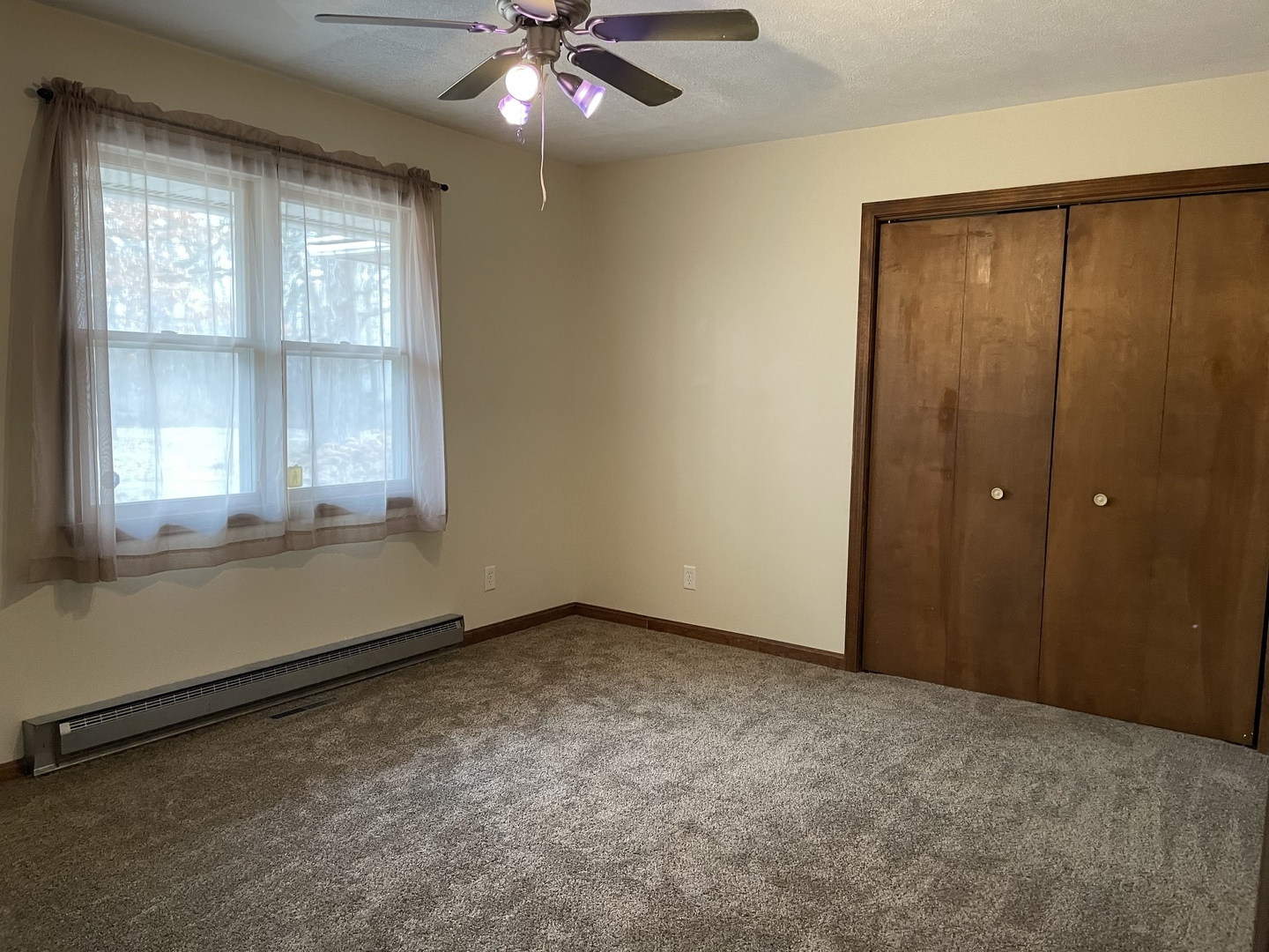 5650 West Bluff Road Morris, IL 60450 - Photo 27 of 53 a view of an empty room with a window