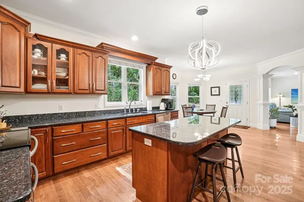 a very nice looking kitchen with a large window