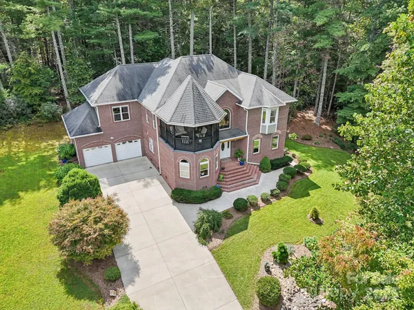 a house with trees in the background