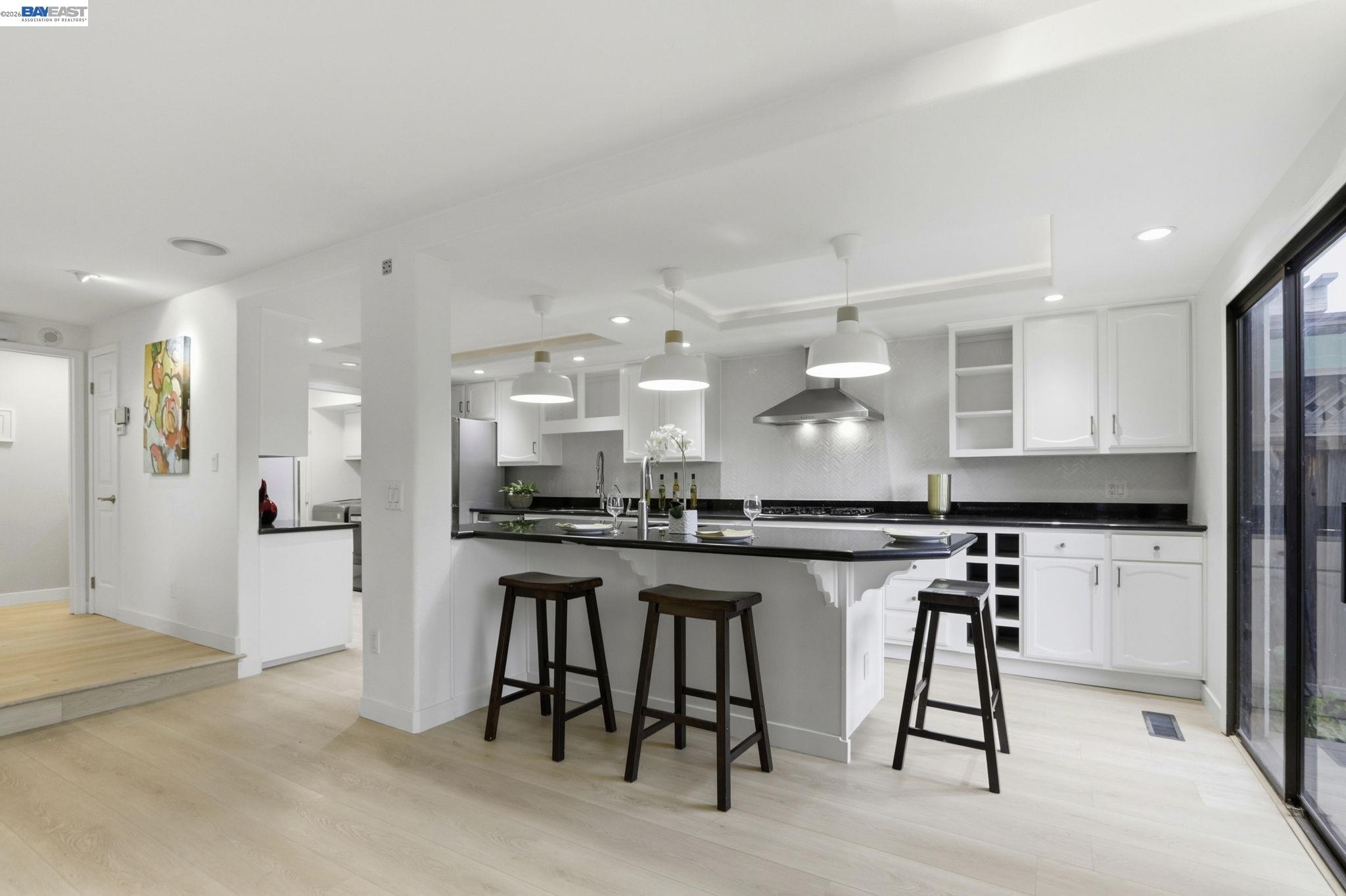 60 Jacklin Place Milpitas, CA 95035 - Photo 11 of 45 a large kitchen with a table and chairs