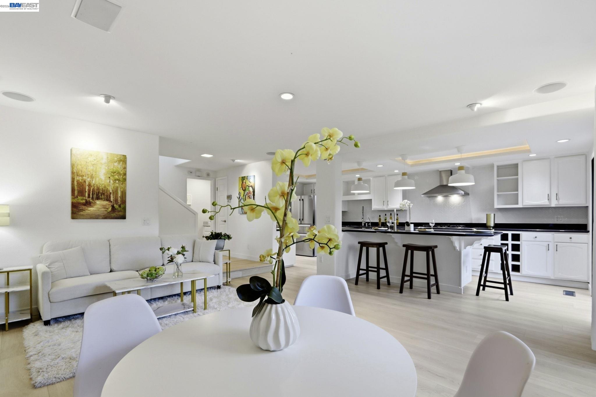 60 Jacklin Place Milpitas, CA 95035 - Photo 18 of 45 a living room with furniture a clock and a view of living room