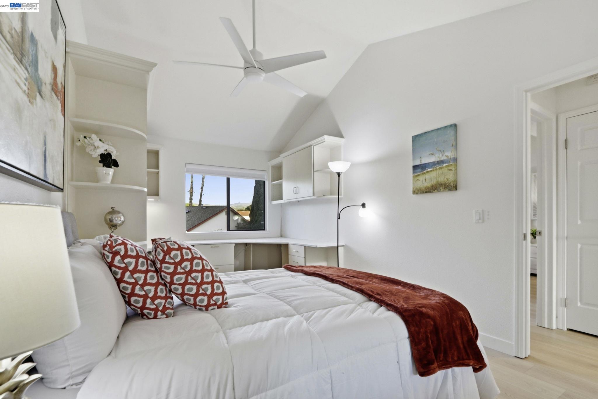 60 Jacklin Place Milpitas, CA 95035 - Photo 21 of 45 a bedroom with a large bed and a chandelier