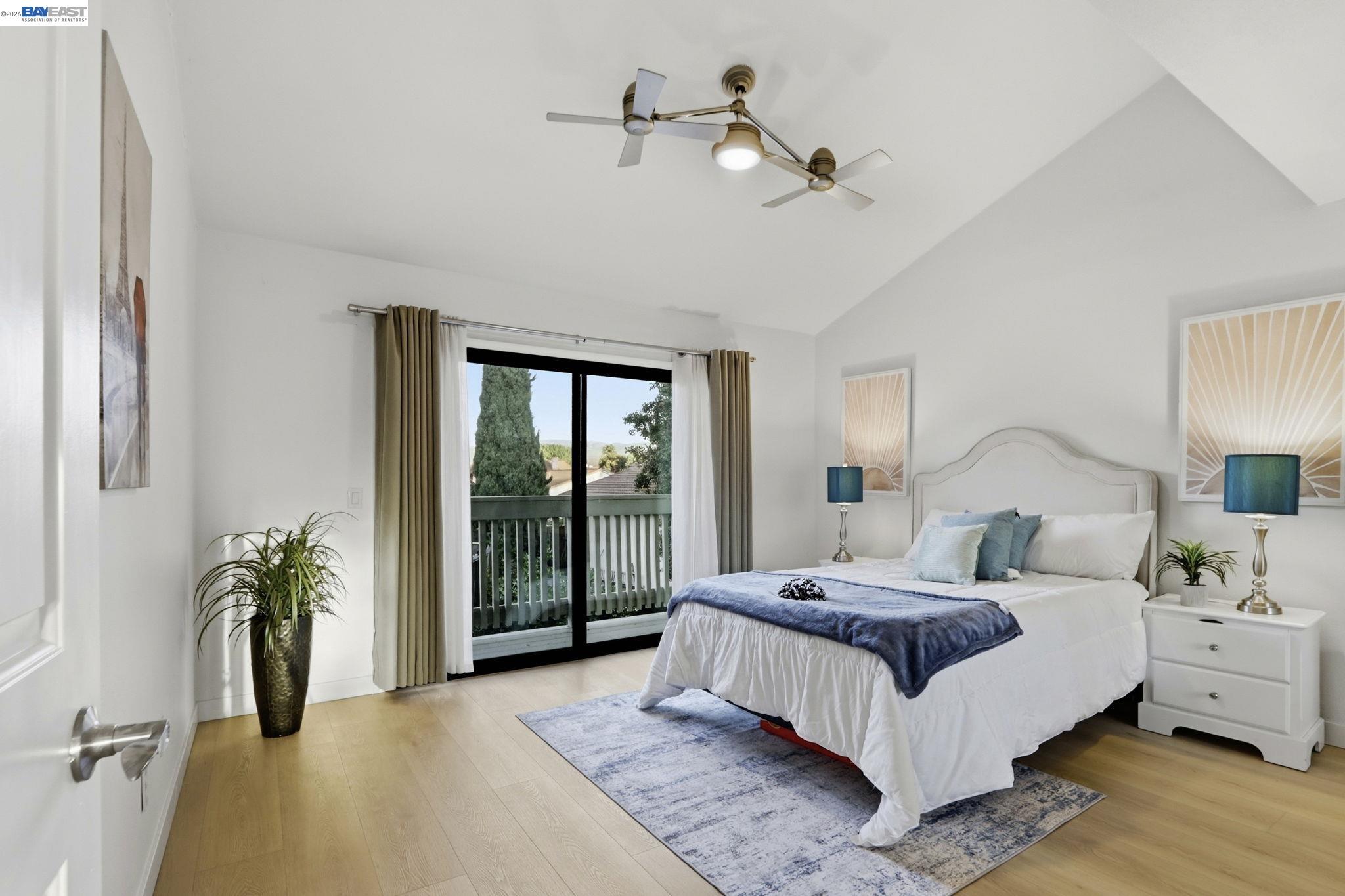 60 Jacklin Place Milpitas, CA 95035 - Photo 23 of 45 a spacious bedroom with a bed and a potted plant