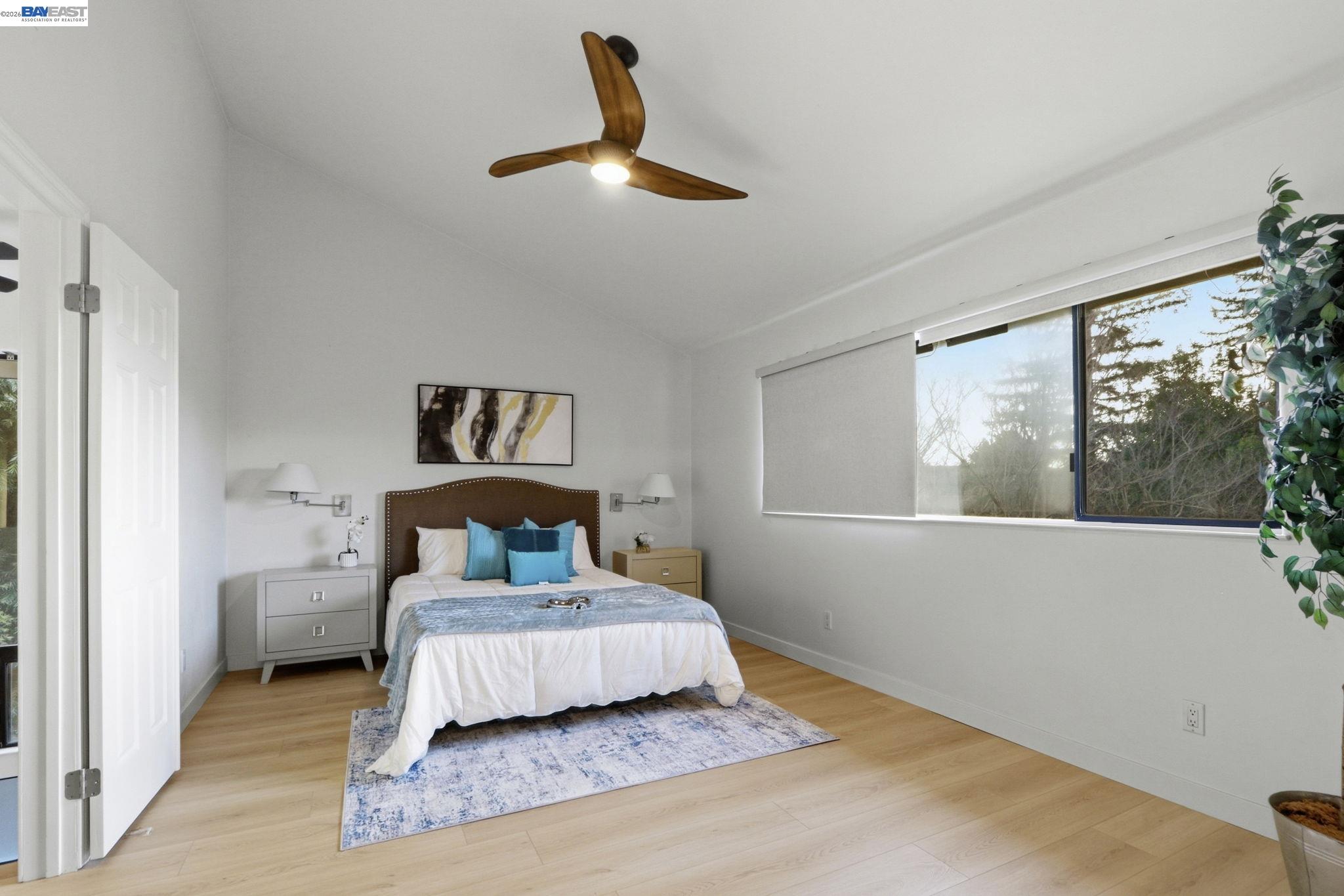 60 Jacklin Place Milpitas, CA 95035 - Photo 25 of 45 a bedroom with a bed and window