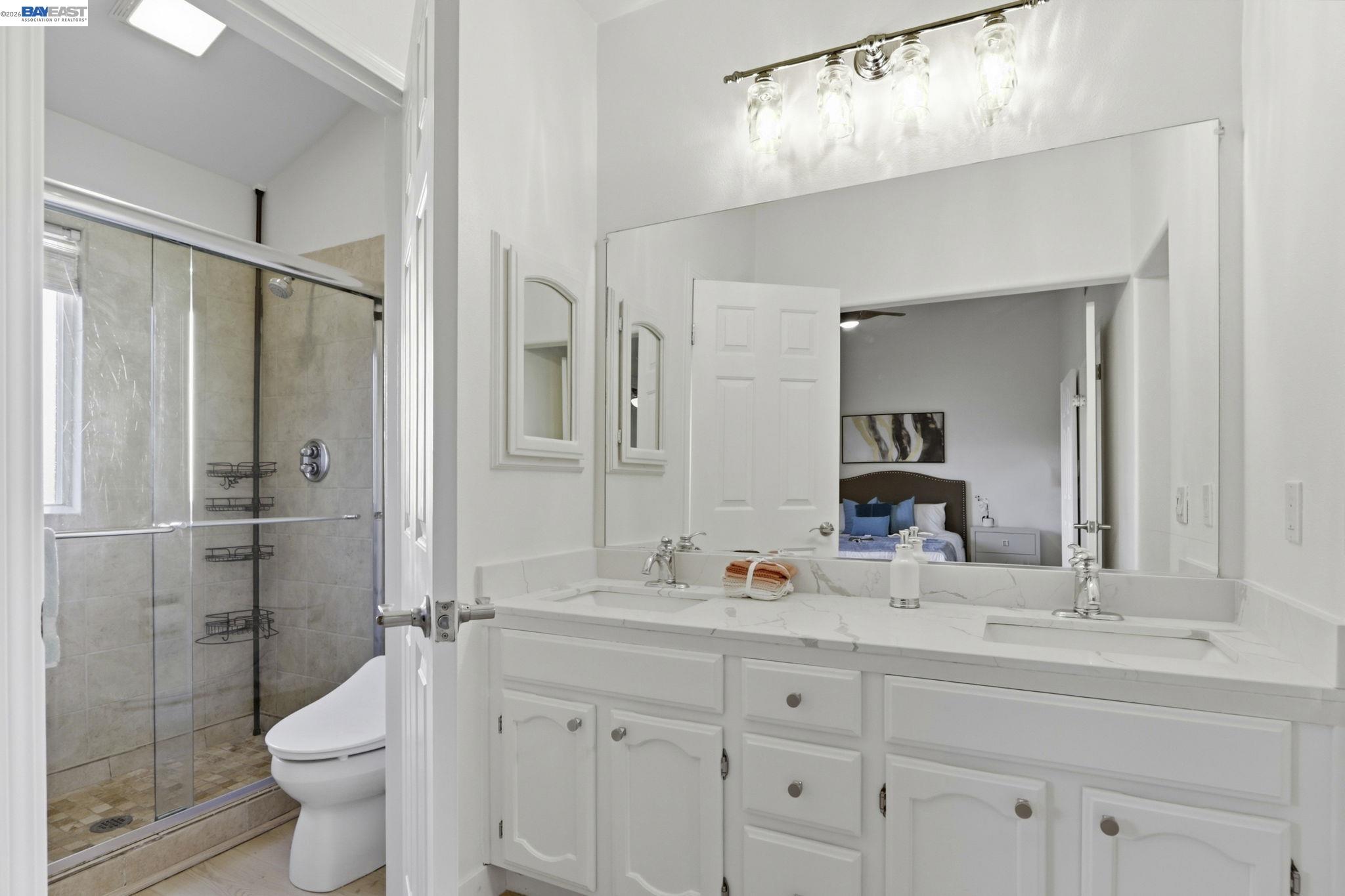 60 Jacklin Place Milpitas, CA 95035 - Photo 31 of 45 a bathroom with a sink toilet and shower