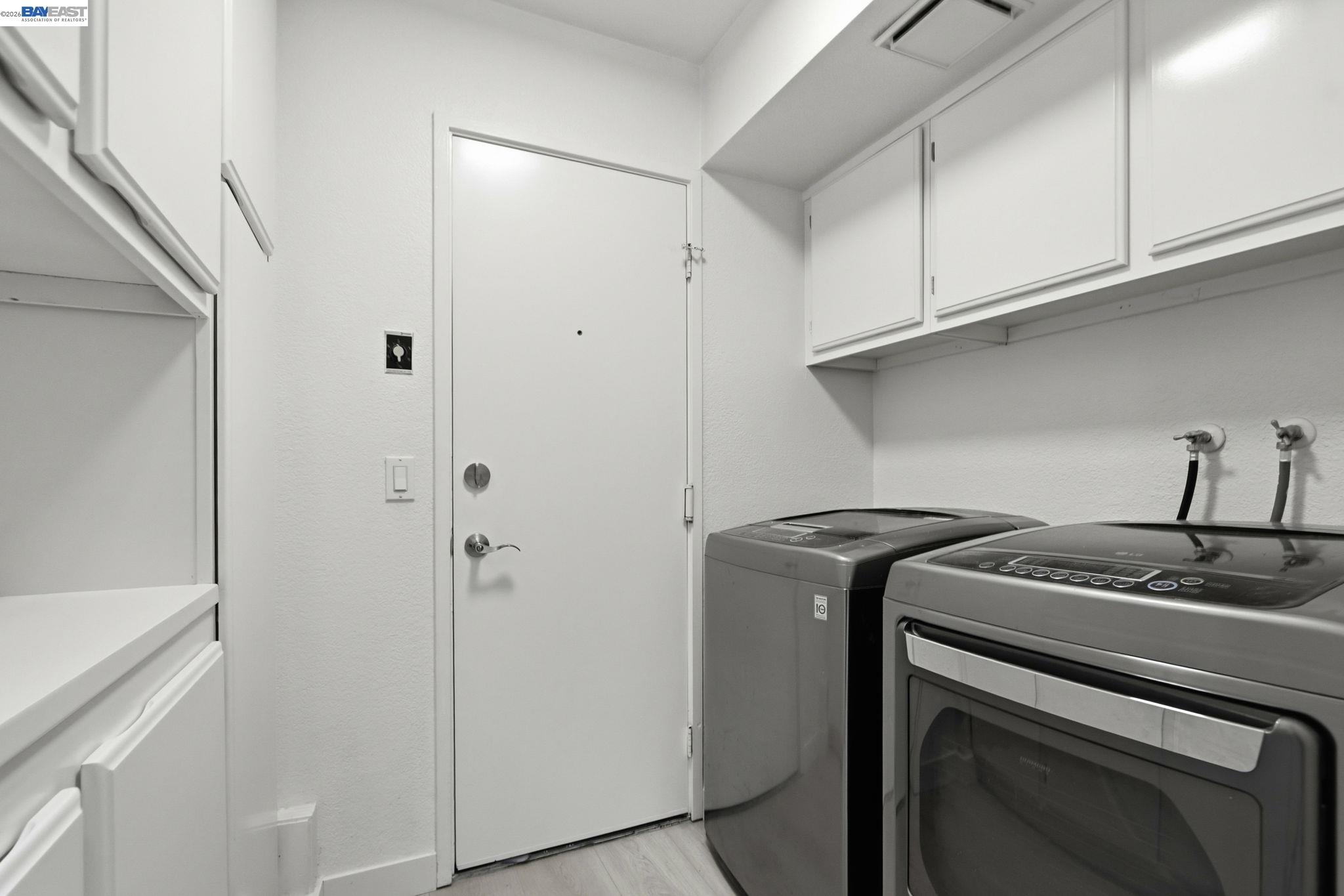 60 Jacklin Place Milpitas, CA 95035 - Photo 37 of 45 a utility room with dryer and washer