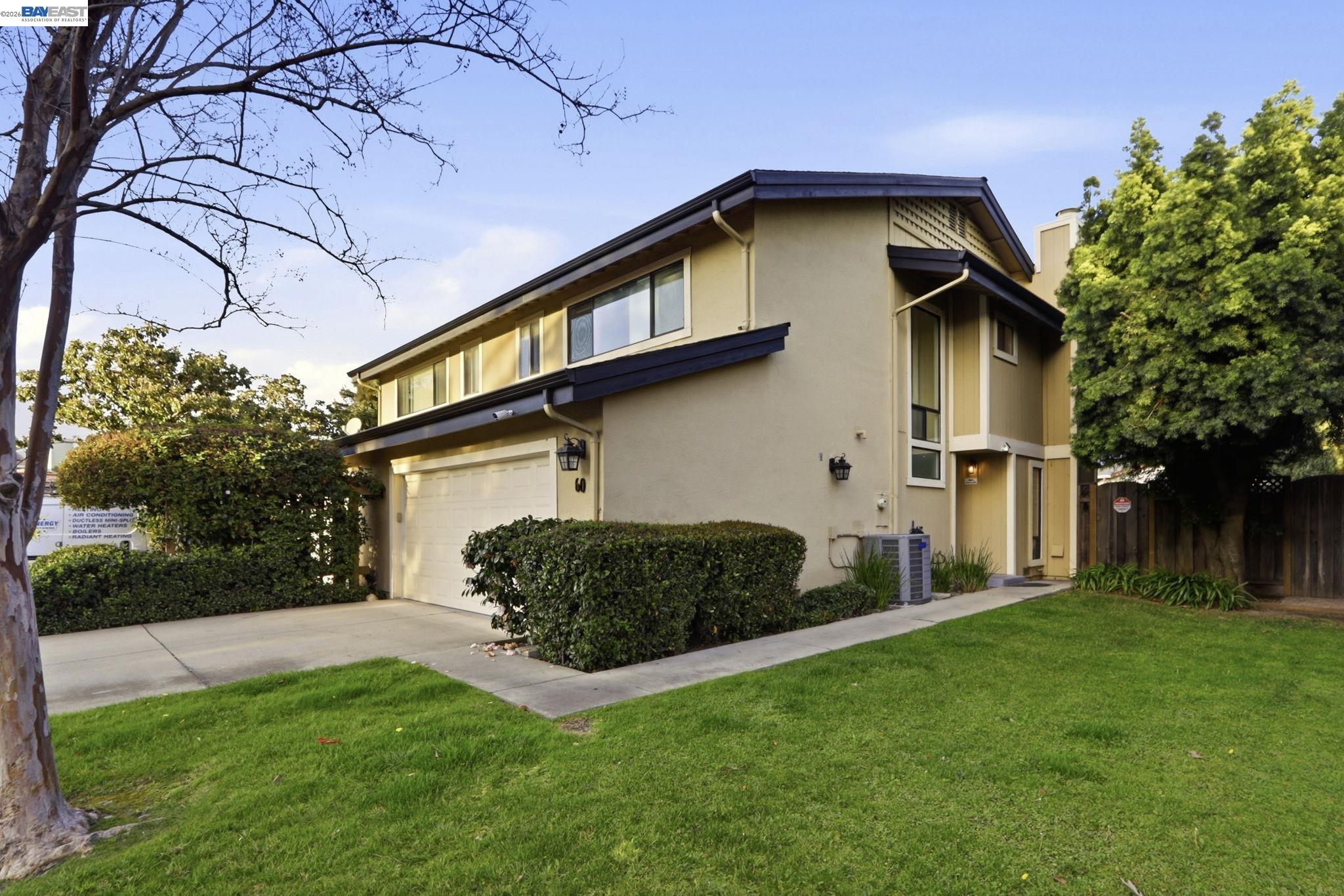 60 Jacklin Place Milpitas, CA 95035 - Photo 4 of 45 a view of a backyard with potted plants and large tree