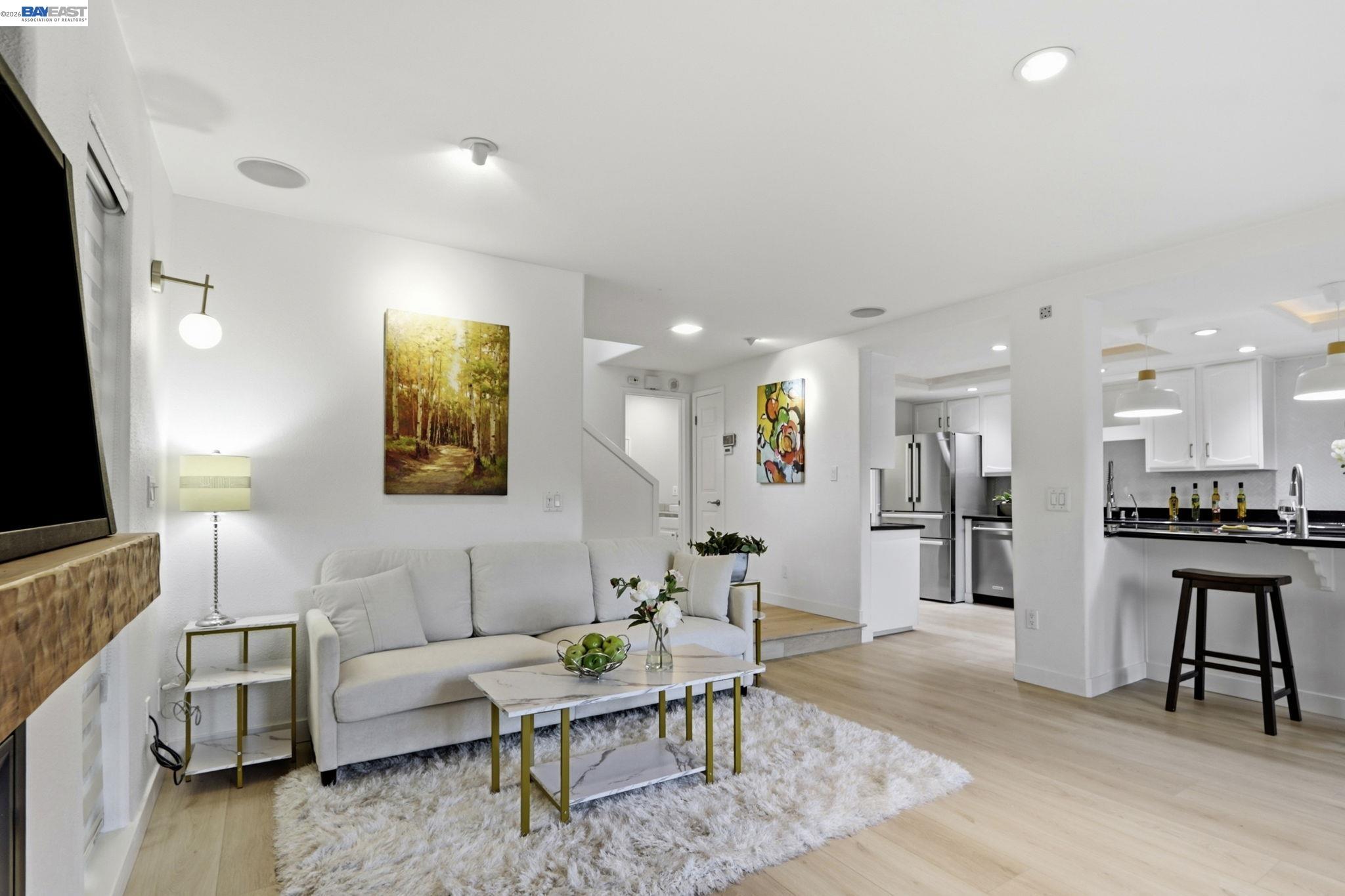 60 Jacklin Place Milpitas, CA 95035 - Photo 9 of 45 a living room with furniture and a flat screen tv