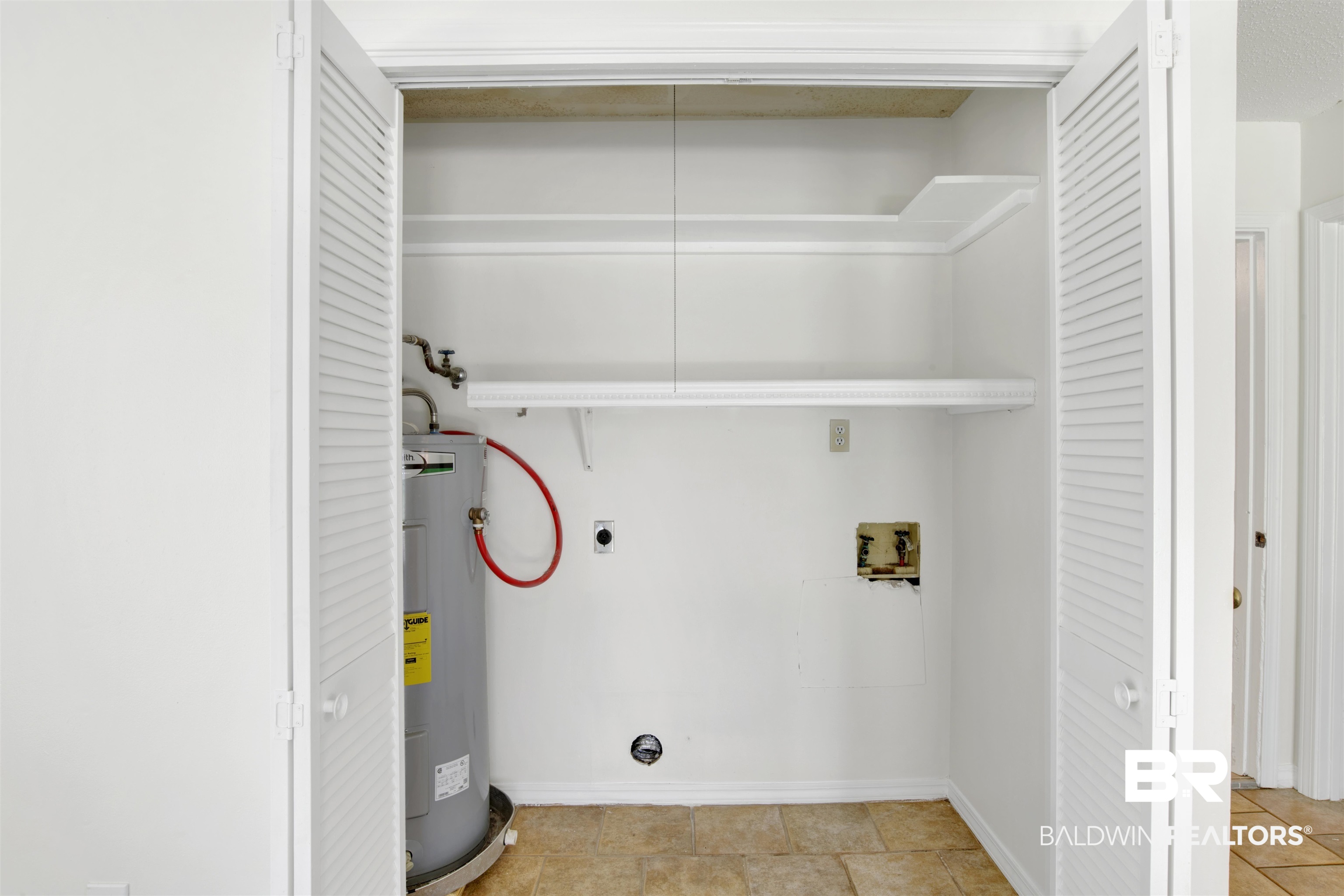 5480 Country Club Boulevard Theodore, AL 36582 - Photo 14 of 36 Laundry area with washer hookup, hookup for an electric dryer, and electric water heater