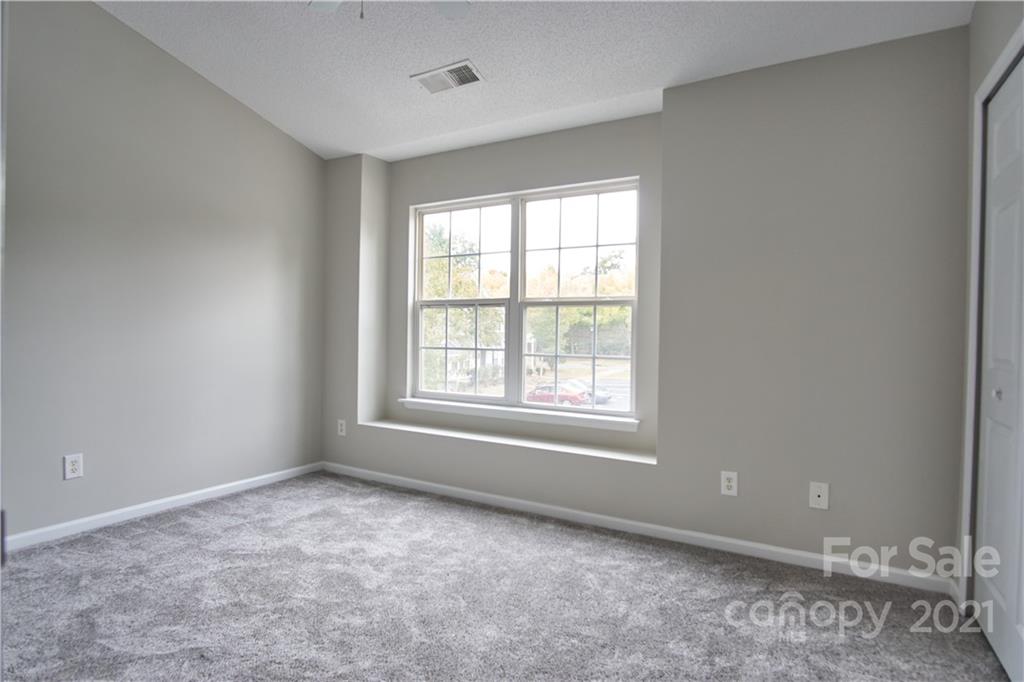 3235 Blythe Ridge Court Charlotte, NC 28213 - Photo 6 of 14 an empty room with a window