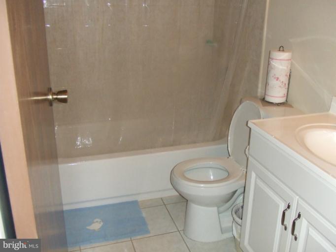 23 Cross Ridge Court Germantown, MD 20874 - Photo 13 of 19 a bathroom with a sink and toilet