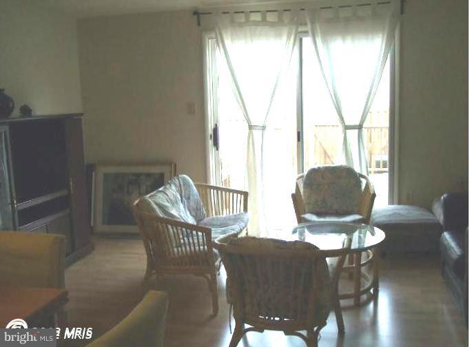 23 Cross Ridge Court Germantown, MD 20874 - Photo 3 of 19 a living room with furniture and a window
