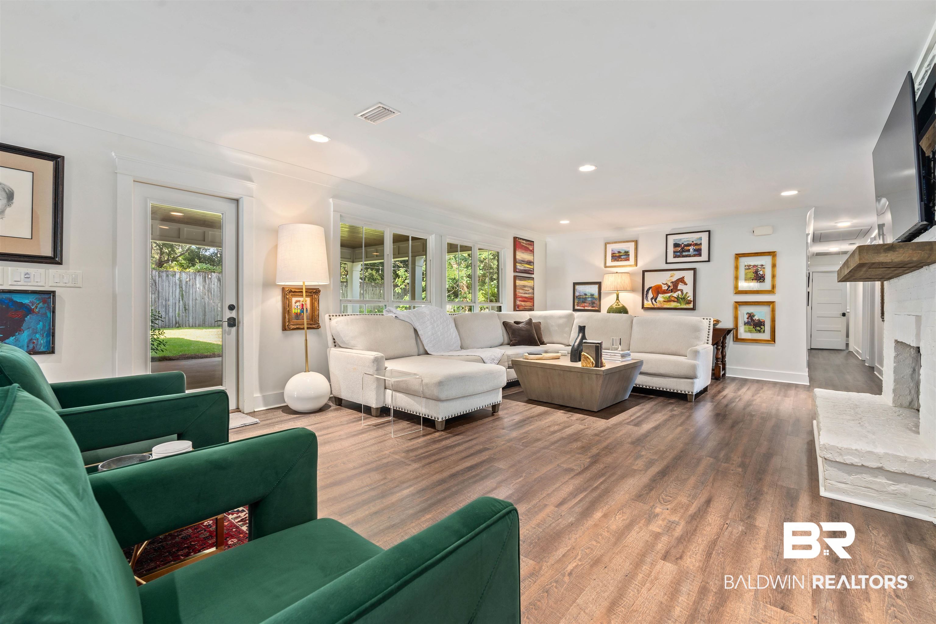 3808 Claridge Road North Mobile, AL 36608 - Photo 7 of 43 Living room featuring a healthy amount of sunlight and hardwood / wood-style floors