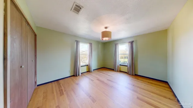 a view of empty room with a window