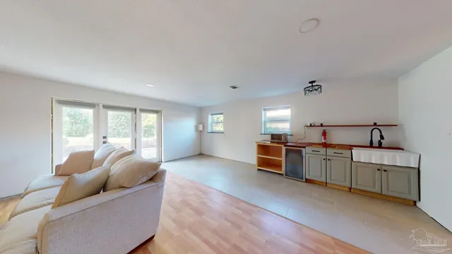 a living room with furniture and a window