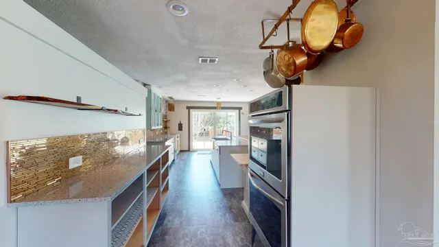 a view of stairs and with wooden floor