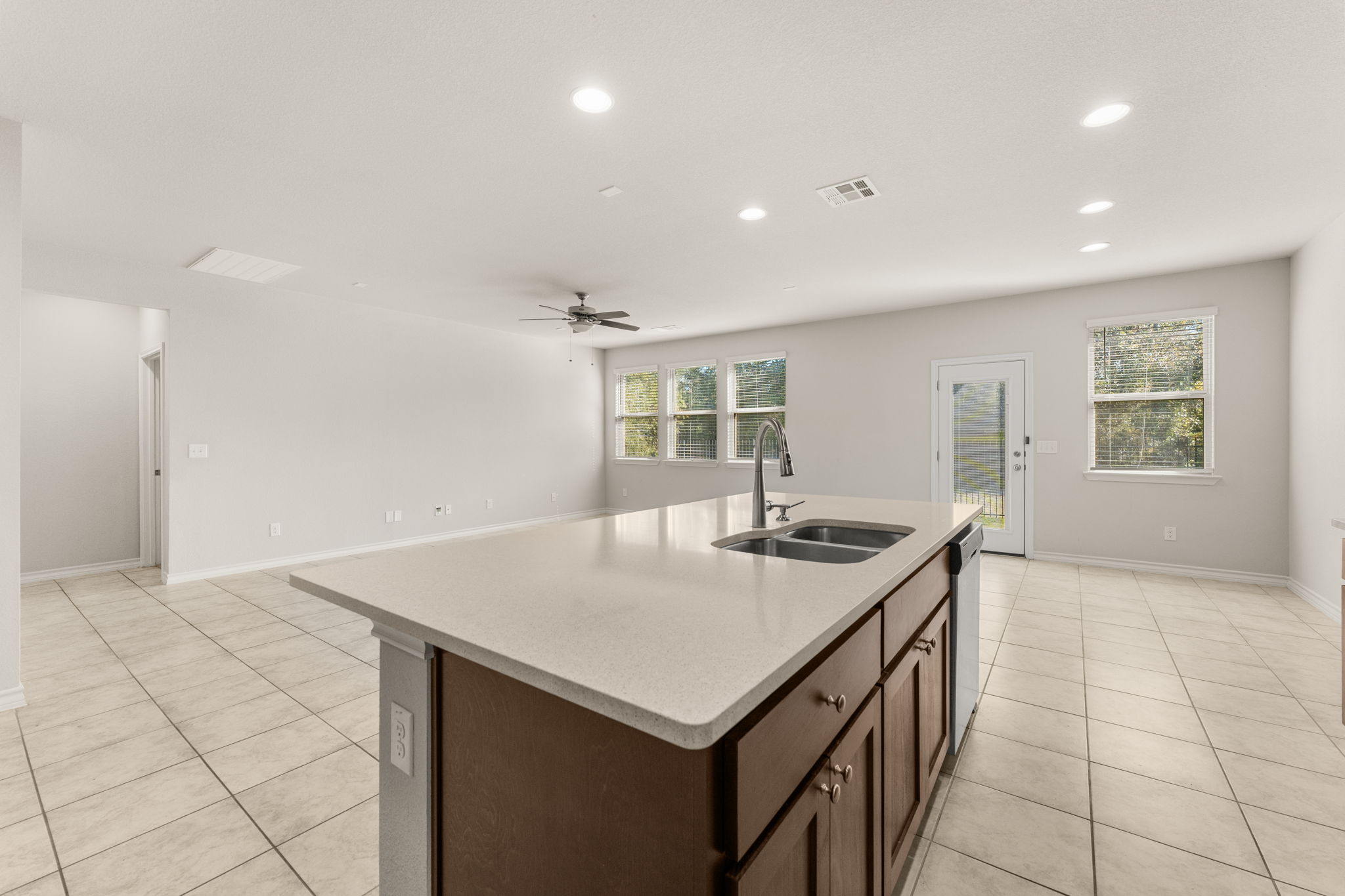 740 Aliso Trail Leander, TX 78641 - Photo 14 of 35 The open design allows the kitchen to overlook both the living room and breakfast area.