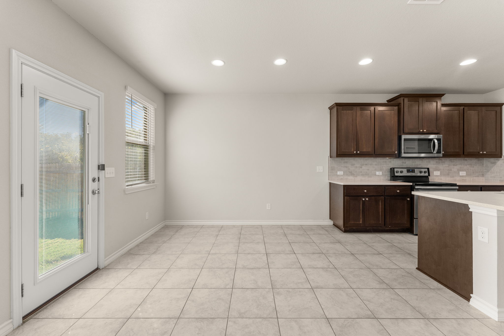 740 Aliso Trail Leander, TX 78641 - Photo 15 of 35 The breakfast area sits just off the kitchen, offering a cozy space for everyday meals.