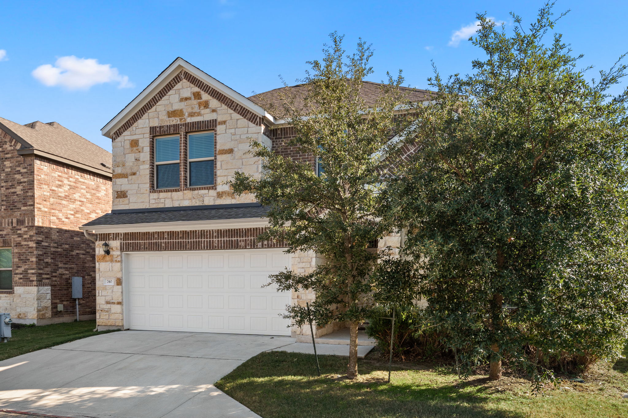 740 Aliso Trail Leander, TX 78641 - Photo 2 of 35 The home's location within a gated community adds privacy and peace of mind.