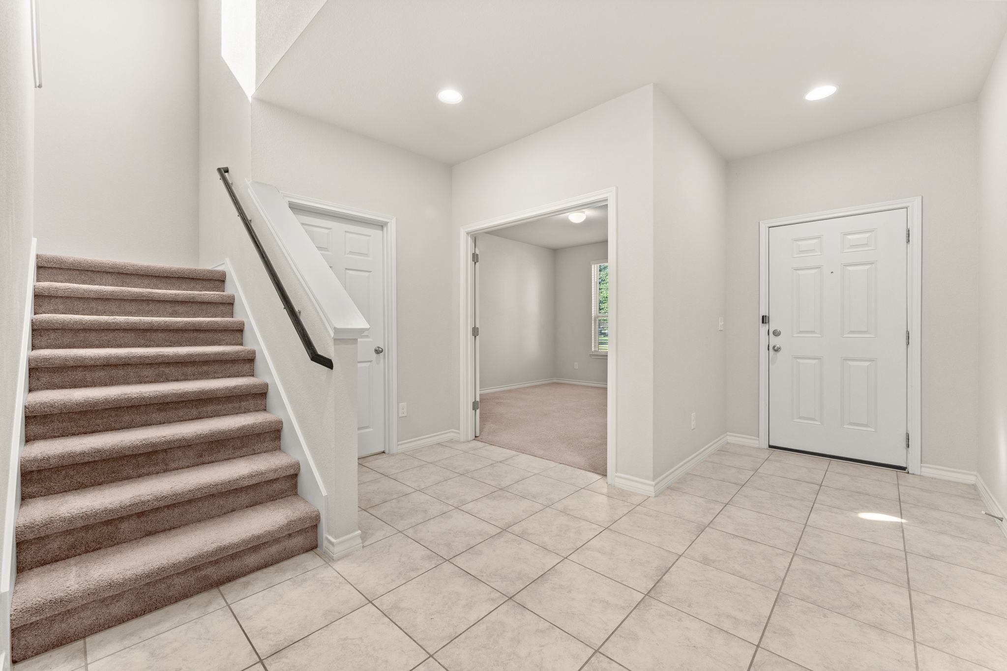 740 Aliso Trail Leander, TX 78641 - Photo 4 of 35 The foyer introduces the home with abundant natural light and an open feel.