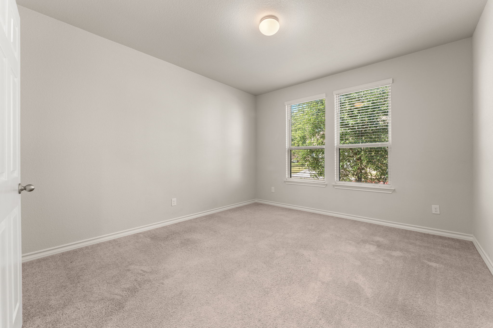 740 Aliso Trail Leander, TX 78641 - Photo 5 of 35 The dedicated home office on the main floor offers a quiet, productive workspace with double doors for privacy .