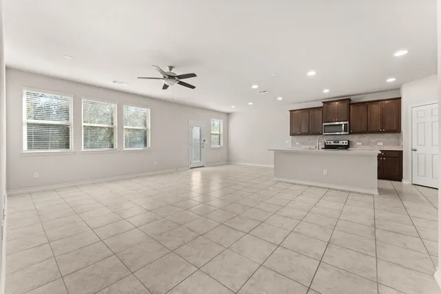 a view of a kitchen with furniture and a kitchen