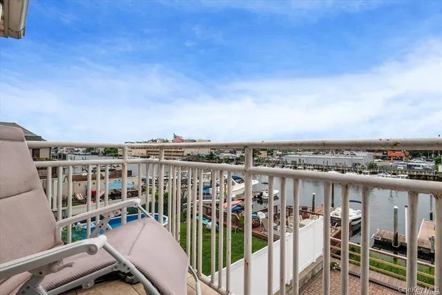 a view of a balcony with city view
