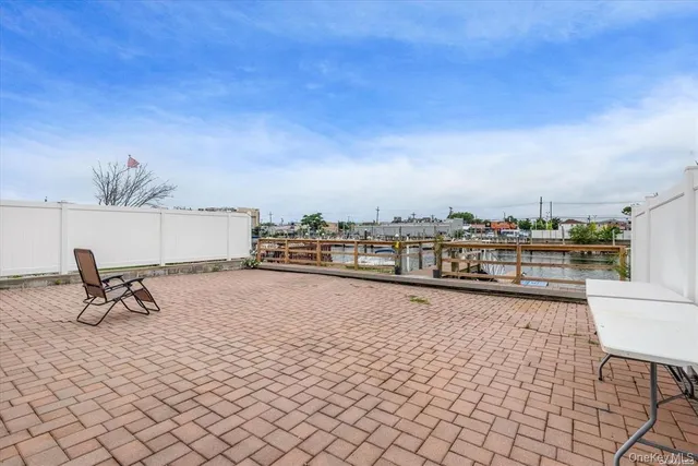 a view of a terrace with chairs
