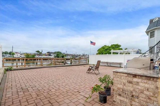a view of a terrace with chairs