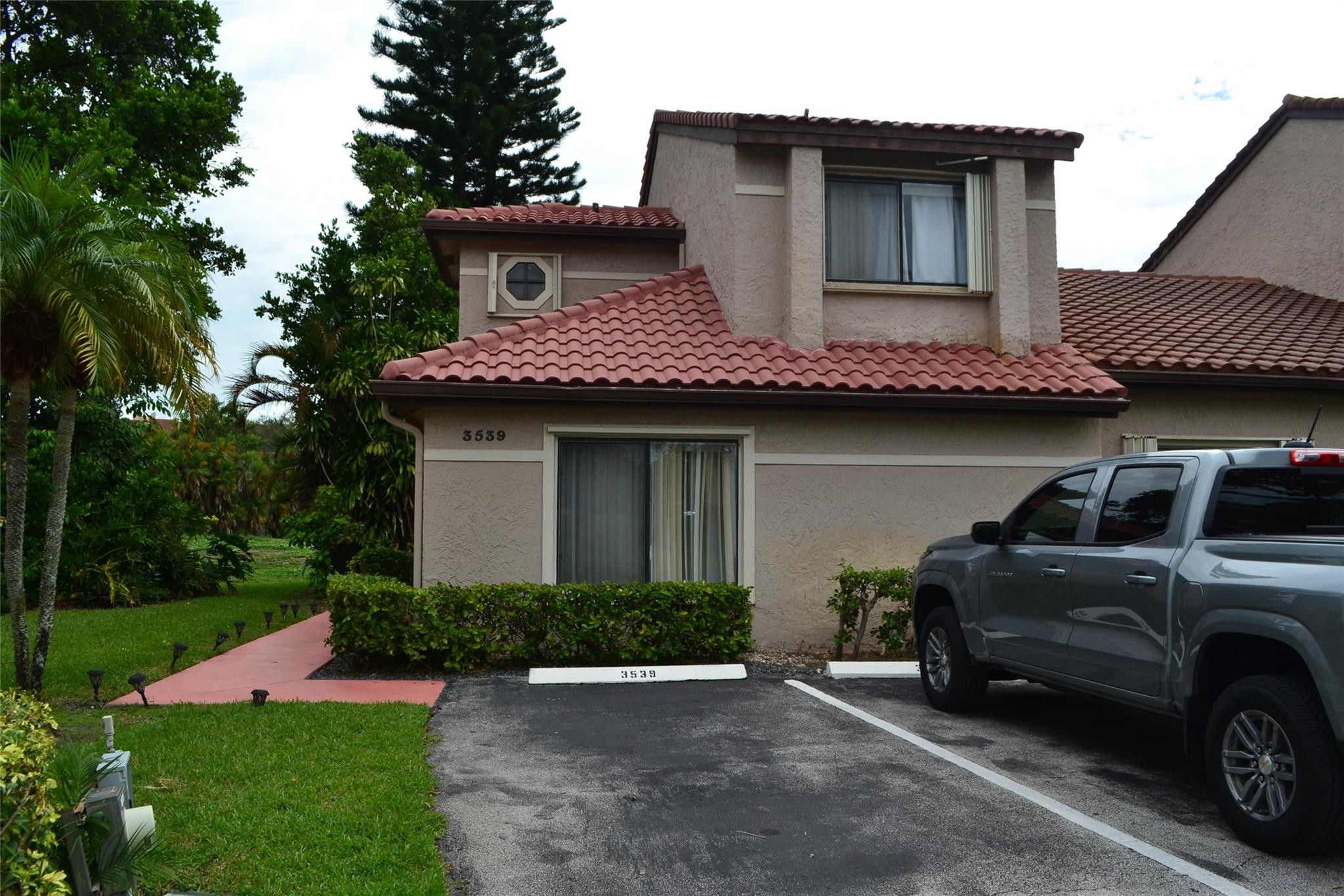 3539 Inverrary Boulevard West Lauderhill, FL 33319 - Photo 1 of 33 a view of a house with a yard