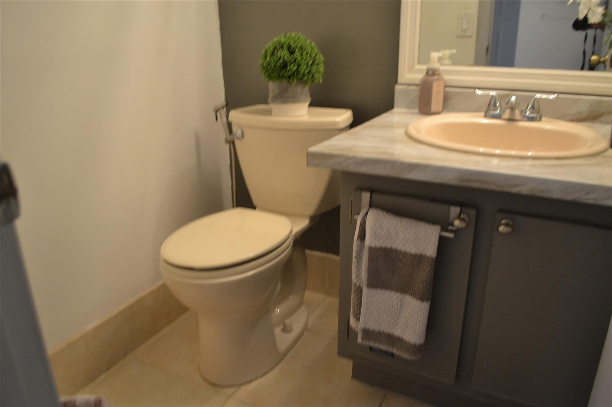3539 Inverrary Boulevard West Lauderhill, FL 33319 - Photo 11 of 33 a bathroom with a toilet and a sink
