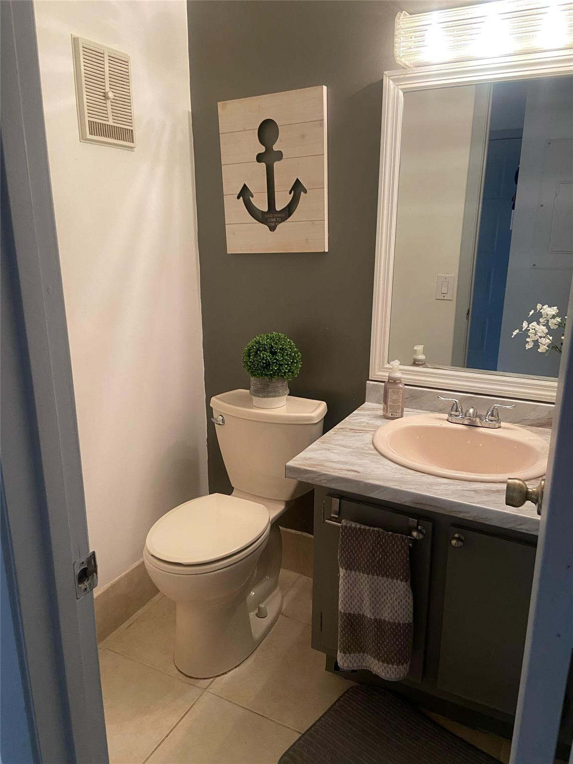 3539 Inverrary Boulevard West Lauderhill, FL 33319 - Photo 12 of 33 a bathroom with a sink and a toilet