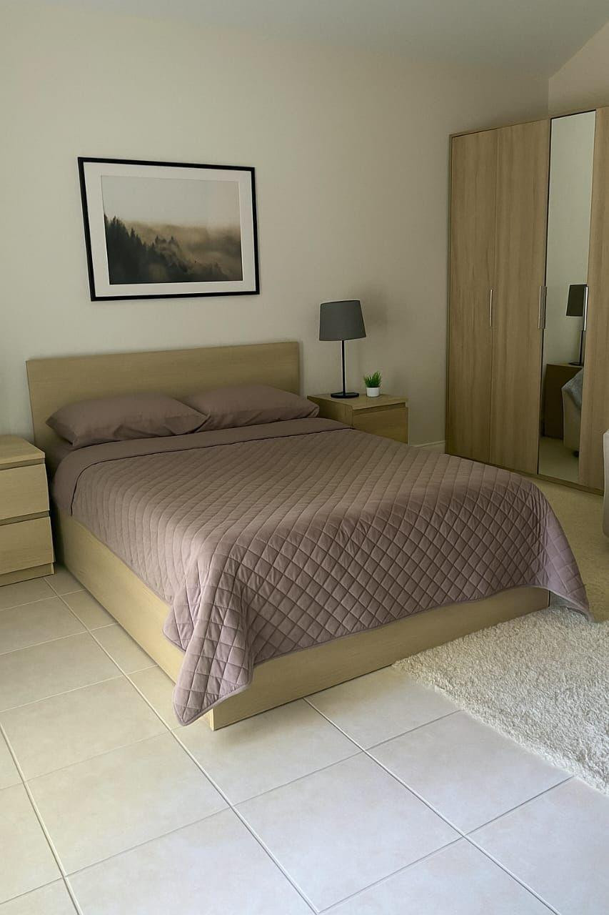 3539 Inverrary Boulevard West Lauderhill, FL 33319 - Photo 14 of 33 a bedroom with a bed and a painting on the wall