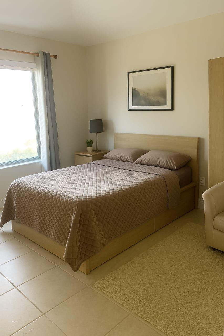 3539 Inverrary Boulevard West Lauderhill, FL 33319 - Photo 15 of 33 a bedroom with a bed and a painting on the wall