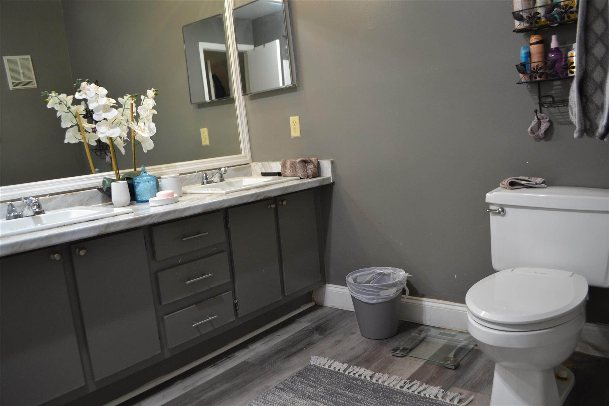 3539 Inverrary Boulevard West Lauderhill, FL 33319 - Photo 17 of 33 a bathroom with a toilet sink and mirror