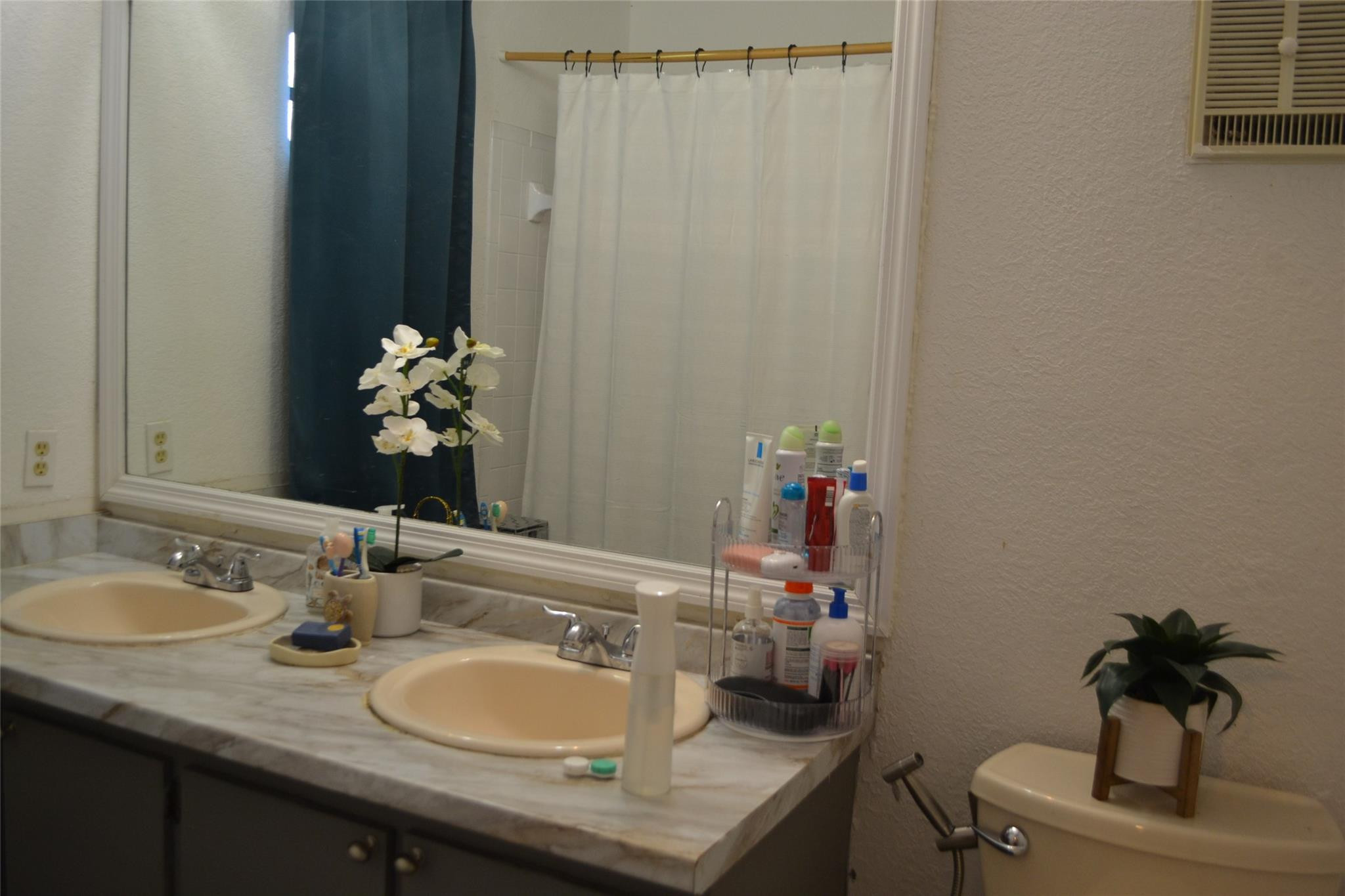 3539 Inverrary Boulevard West Lauderhill, FL 33319 - Photo 23 of 33 a bathroom with a granite countertop sink and a mirror