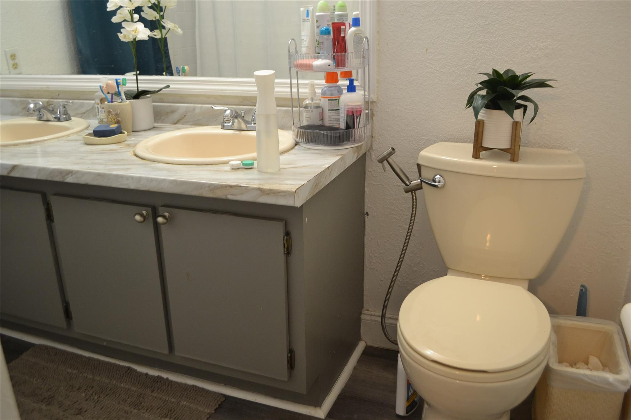 3539 Inverrary Boulevard West Lauderhill, FL 33319 - Photo 24 of 33 a bathroom with a granite countertop toilet sink and mirror