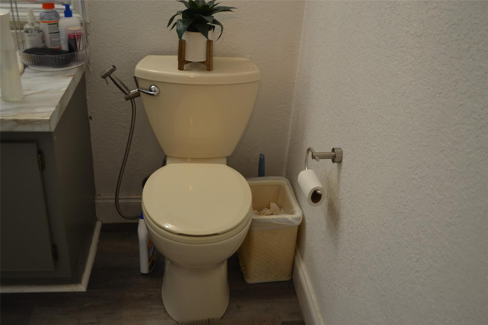 3539 Inverrary Boulevard West Lauderhill, FL 33319 - Photo 26 of 33 a white toilet sitting next to a sink