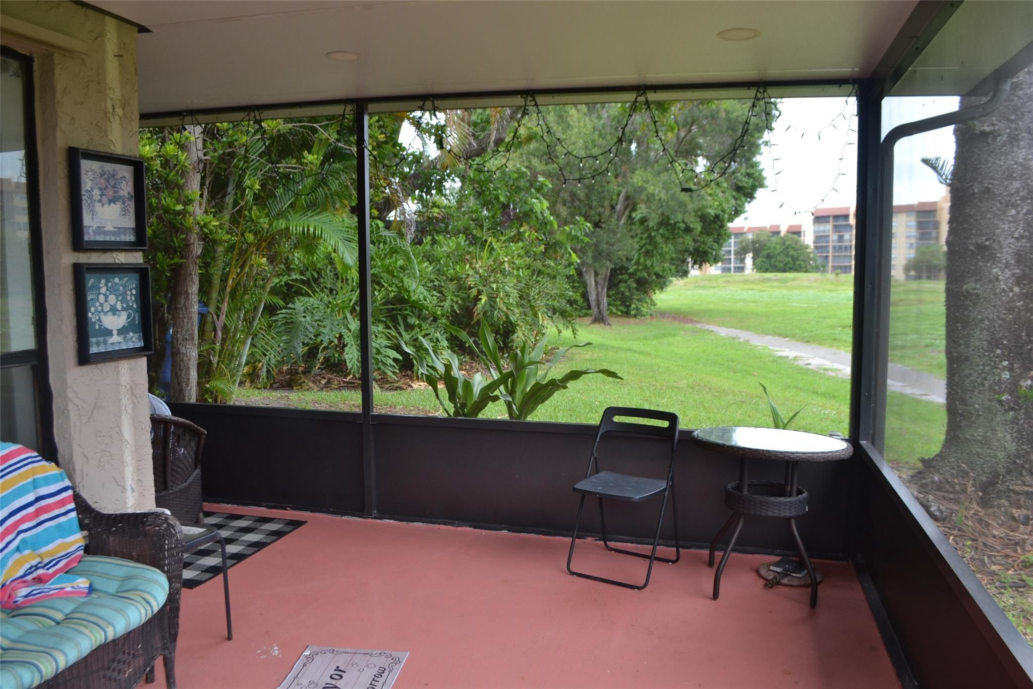 3539 Inverrary Boulevard West Lauderhill, FL 33319 - Photo 29 of 33 a view of a chairs and table in patio