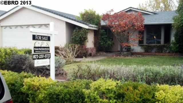1156 Viewpointe Boulevard Rodeo, CA 94572 - Photo 1 of 1 a view of a house with a yard and plants