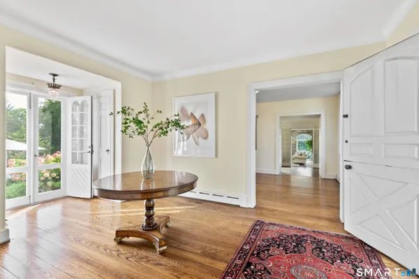 a living room with furniture and a table